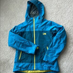 The North Face blue and yellow hooded lightweight, water resistant winter coat
